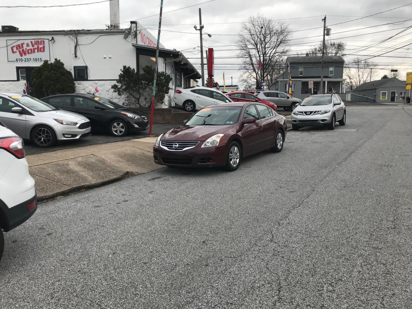 2010 Maroon /Gray Nissan Altima 2.5 (1N4AL2APXAN) , Automatic transmission, located at 577 Chester Pike, Prospect Park, PA, 19076, (610) 237-1015, 39.886154, -75.302338 - Photo#1